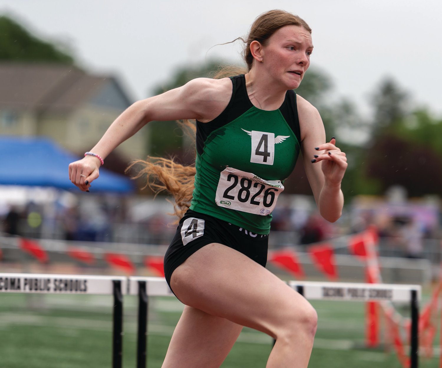 Tumwater's Alyssa Duncan pushes toward the finish line in a 2A Girls 100 Hurdles race at the 2A/3A/4A State Track and Field Championships on Thursday, May 26, 2022, at Mount Tahoma High School in Tacoma. (Joshua Hart/For The Chronicle)
